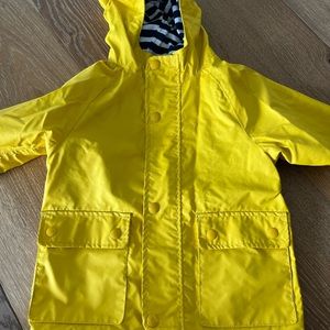gap kids yellow raincoat w blue and white stripped lining